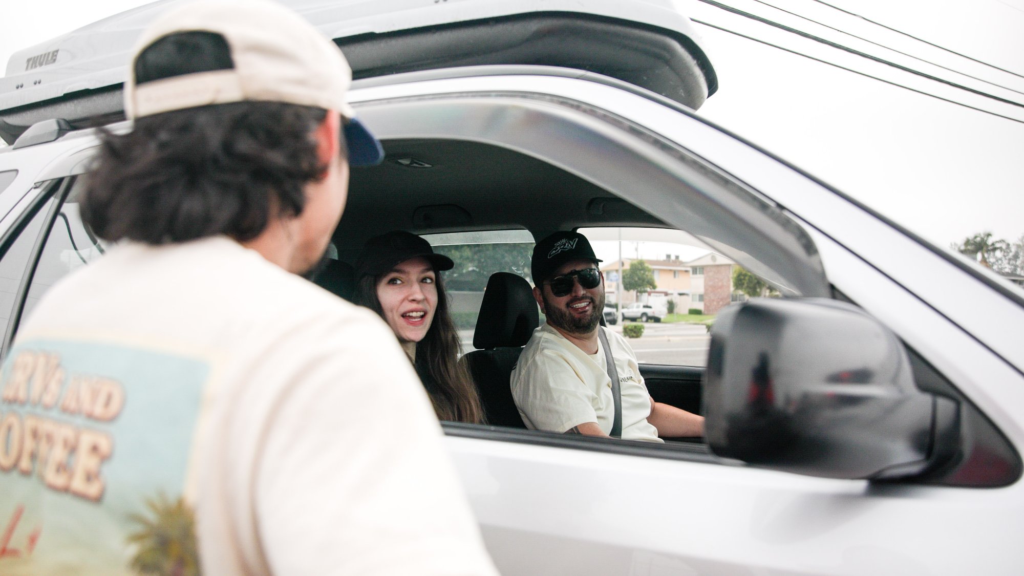 Talking through car window