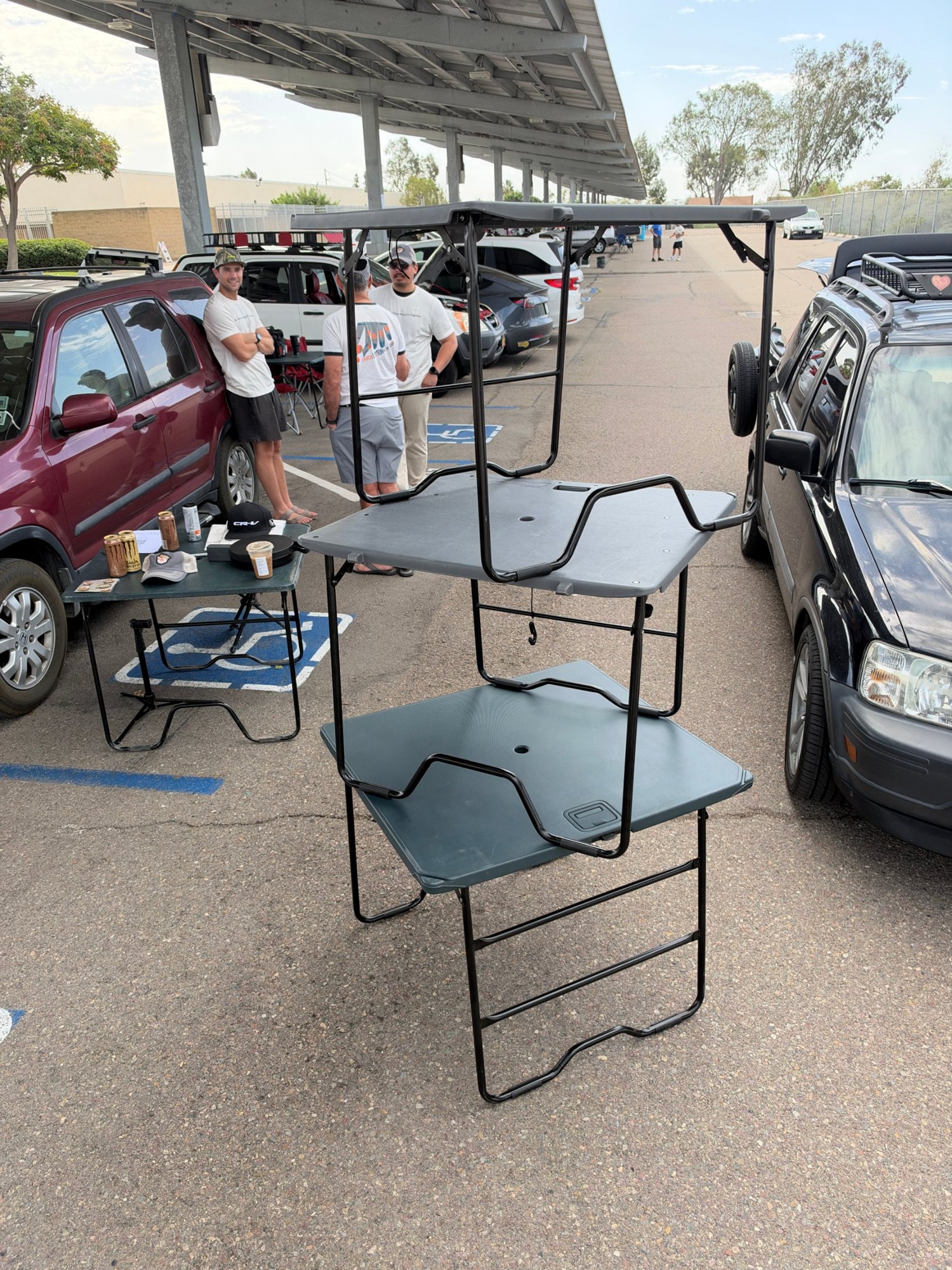 Folding picnic tables stacked at Chapter 3